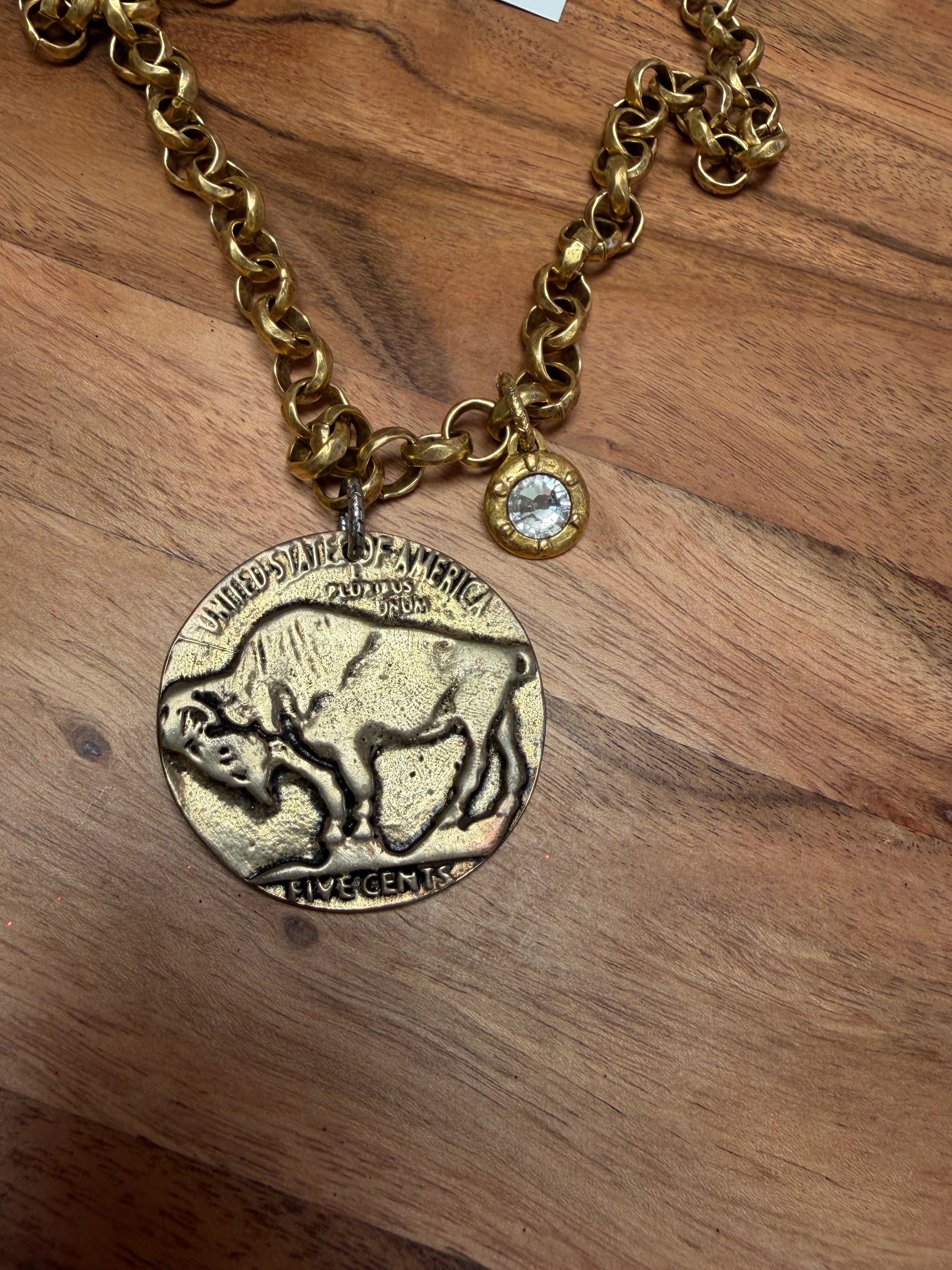 Buffalo Coin and Crystal Necklace by Lula 'n' Lee featuring a coin pendant and sparkling crystals on a silver chain.