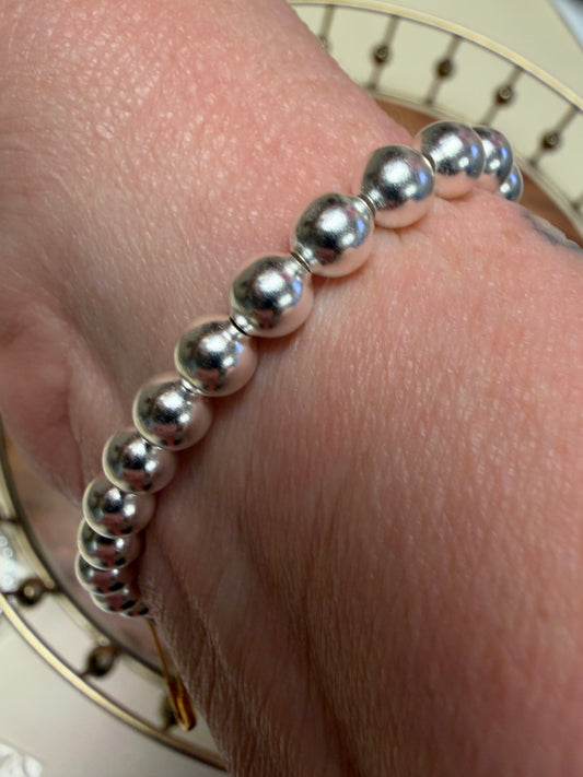 Sterling silver beaded bracelet by Lula 'n' Lee featuring small round beads on a delicate chain.