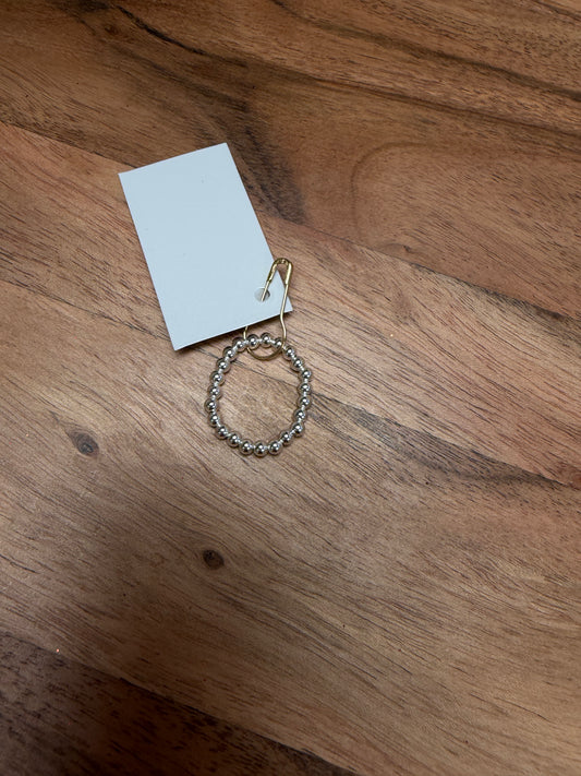 Sterling silver beaded ring from Lula 'n' Lee, showcasing a textured band with small, rounded silver beads.