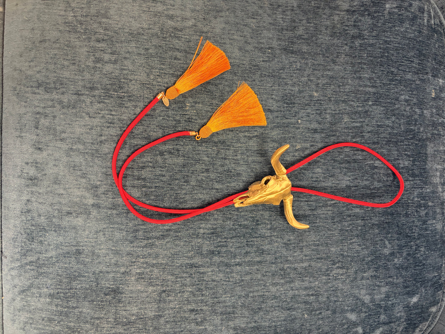 Rahya Bolo Necklace featuring a stylish bolo tie design from Rahya Jewelry Design, with decorative slide and cord.