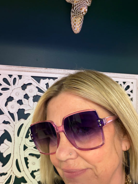 Purple Haze sunglasses by A Sparkling Mess featuring purple-tinted lenses and stylish frame design.