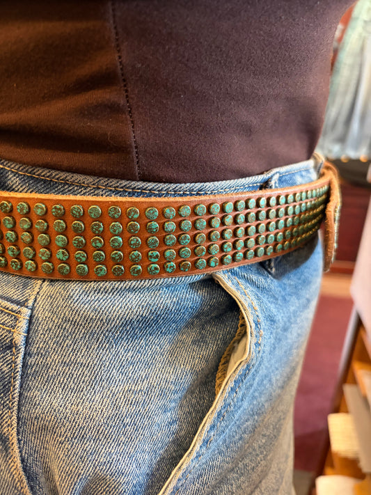 Black leather Eden belt by Amsterdam Heritage with a silver buckle, displayed on a neutral background.