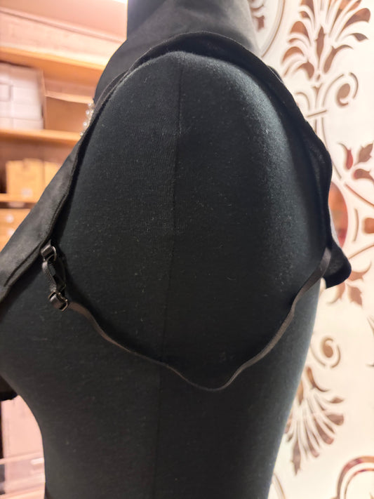 Black Dickie top with pearl and rhinestone embellishments from Queen Gypsy, showcasing intricate details and stylish design.