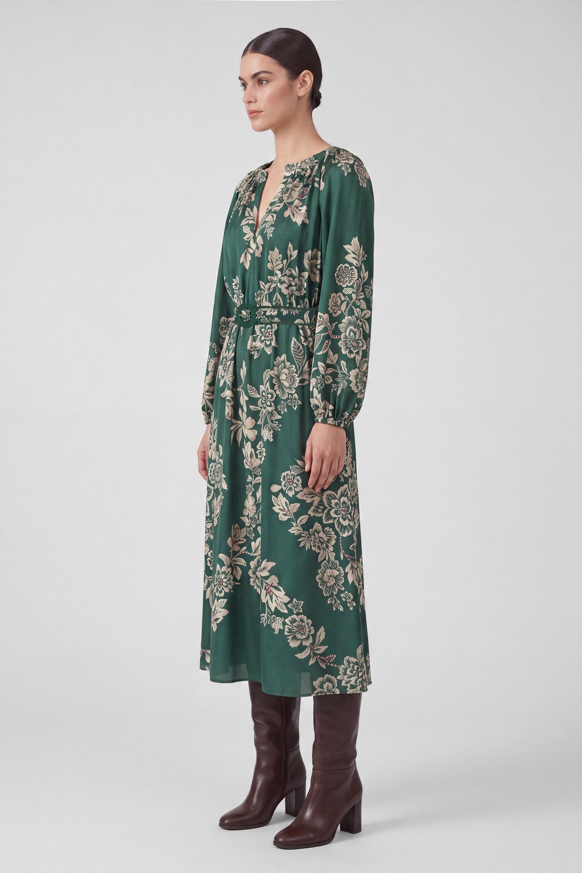 Hunter green maxi dress by Current Air, flowing fabric and sleeveless design, displayed on a hanger against a neutral background.