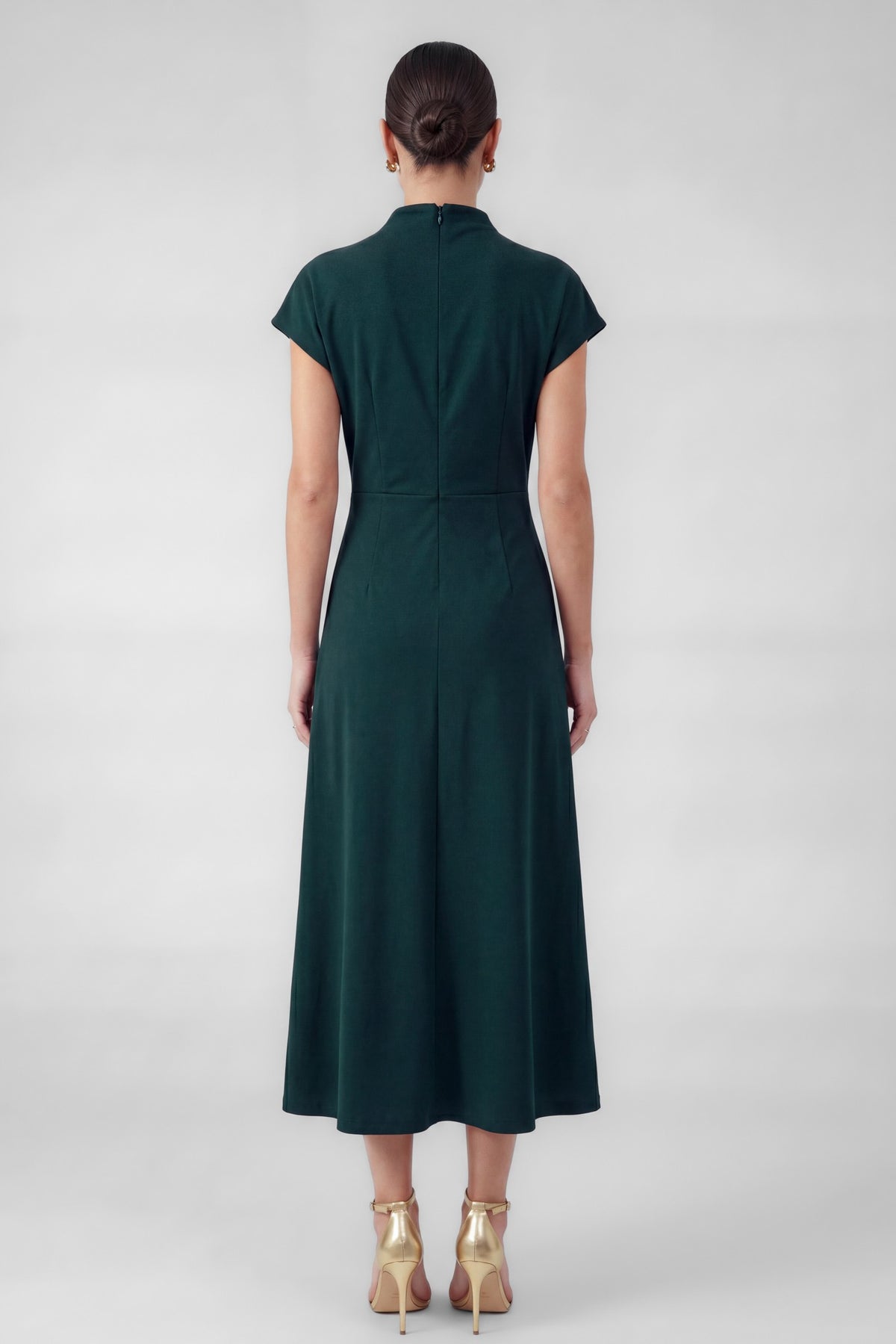 Current Air Keepin’ It Teal Dress displayed on a hanger, featuring a stylish teal dress with a sleeveless design and flowy fabric.