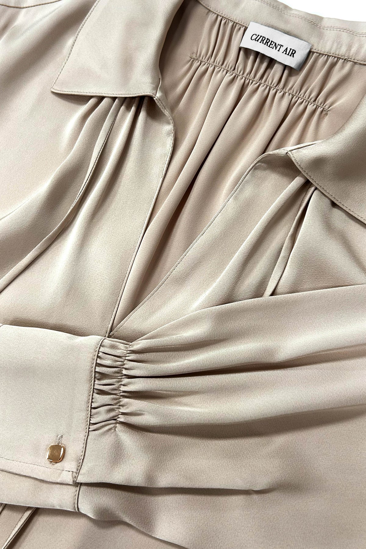 Ecru front tie silky blouse by Current Air, shown with a relaxed fit and smooth fabric, perfect for casual or office wear.