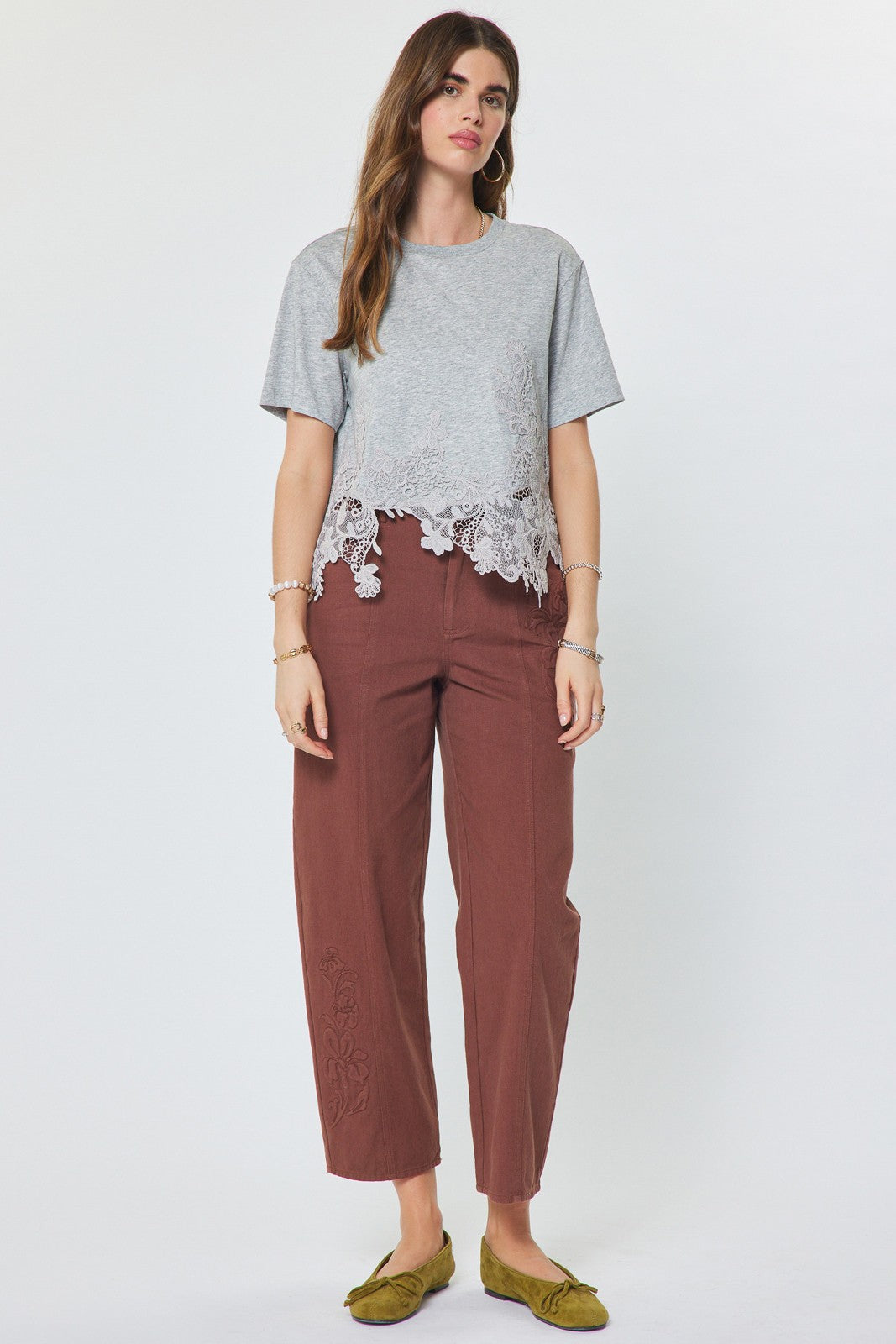 Current Air Lacy Tee top featuring delicate lace fabric and a relaxed fit, perfect for casual or layered style.