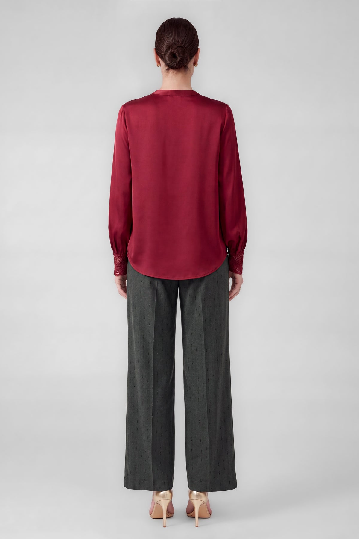 Lace cuff V-neck blouse by Current Air featuring delicate lace details and a stylish V neckline, displayed on a hanger.