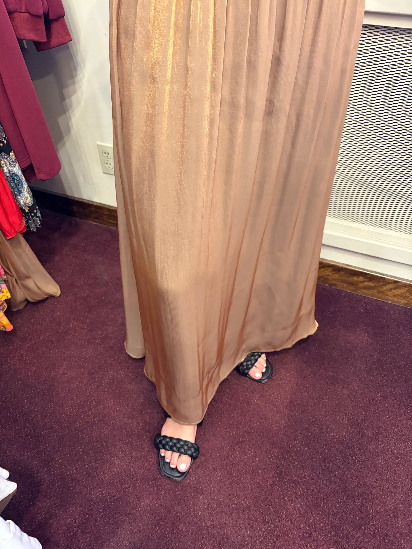 Golden silk halter dress by Current Air, showcasing elegant neckline and flowing fabric perfect for formal occasions.