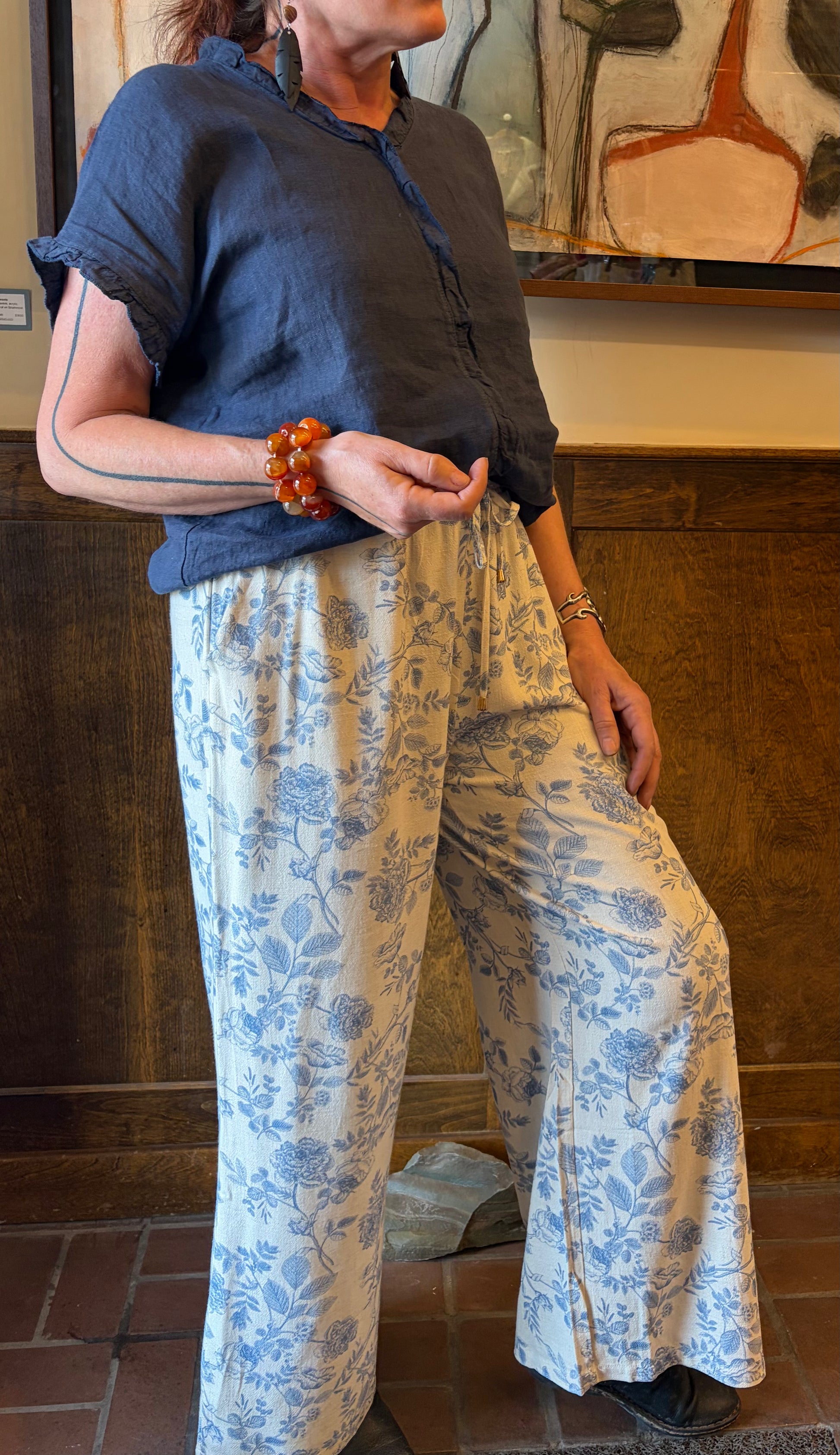 Blue Toile Flowers pants from Camille & Co. bottoms featuring a floral toile print, displayed on a white background.
