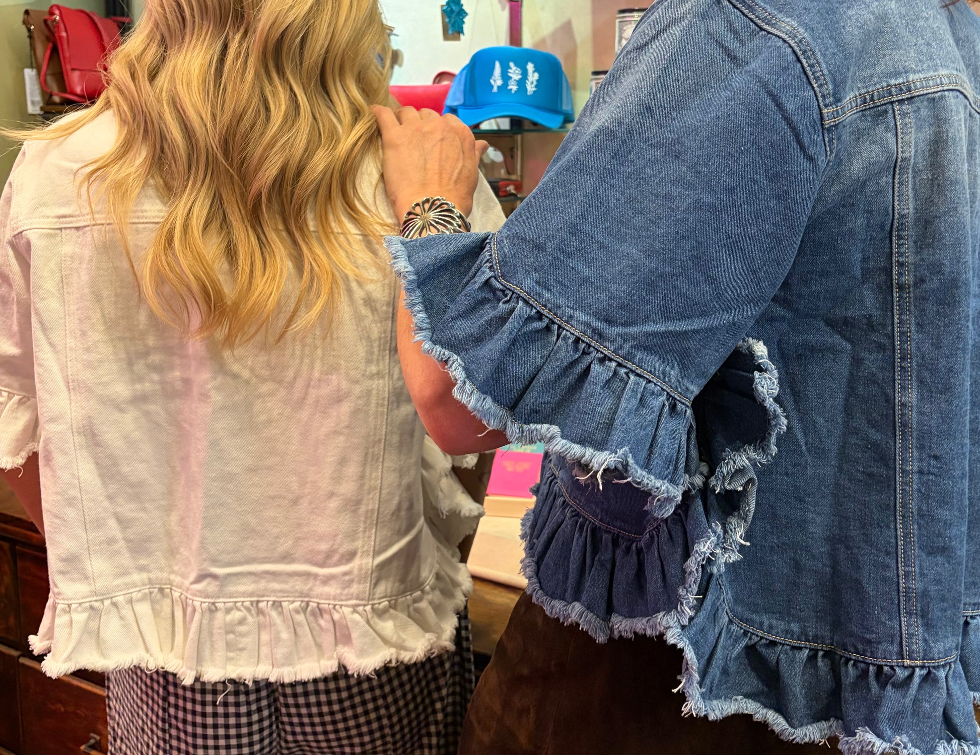 Camille & Co. Ruffle Up Denim Jacket, stylish blue denim top with ruffle details, front buttons, and classic collar.