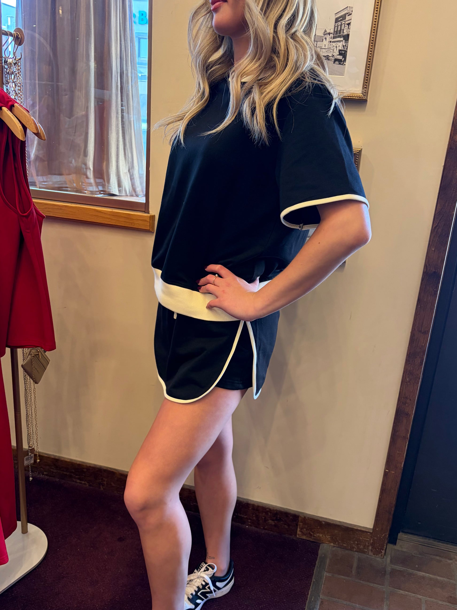 Black and cream skort shorts by Simply Southern, featuring a stylish design and comfortable fit, shown in the product image.