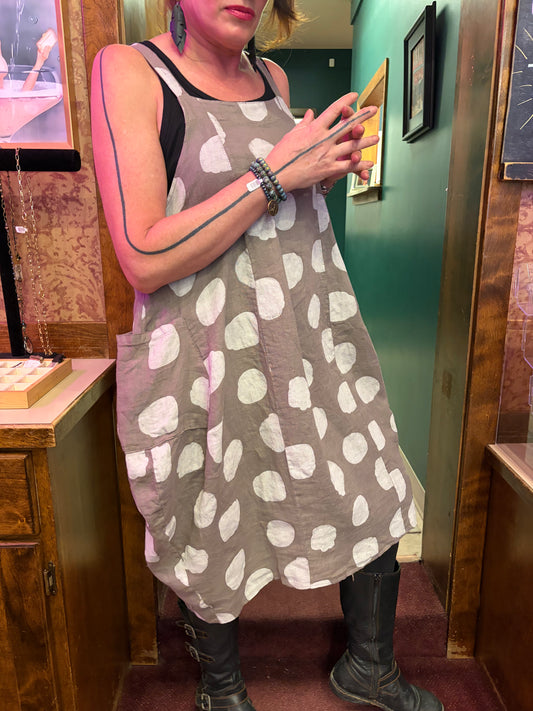 Light beige Dotty Linen Dress by Princess & Buck featuring a relaxed fit and playful polka dot pattern.