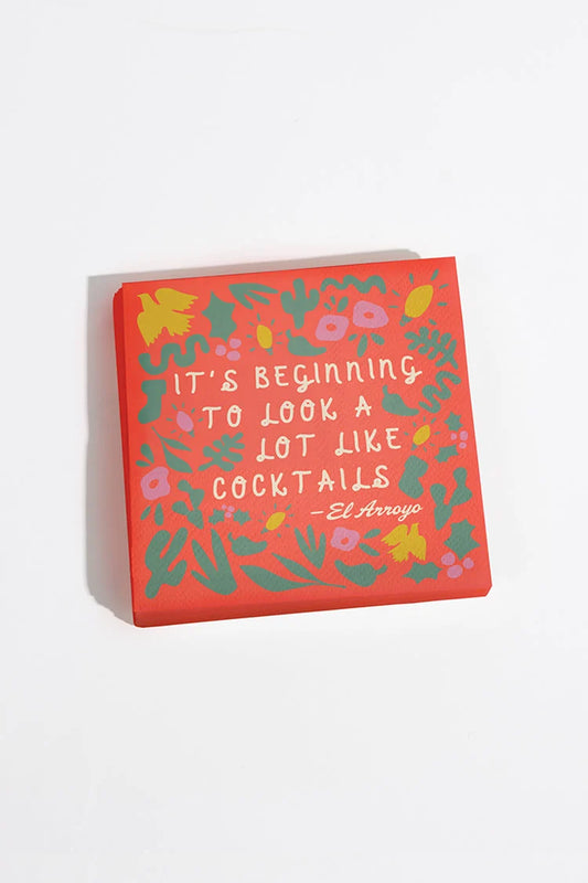 El Arroyo It's Beginning to Look cocktail napkins featuring festive holiday design with colorful illustrations and lettering.