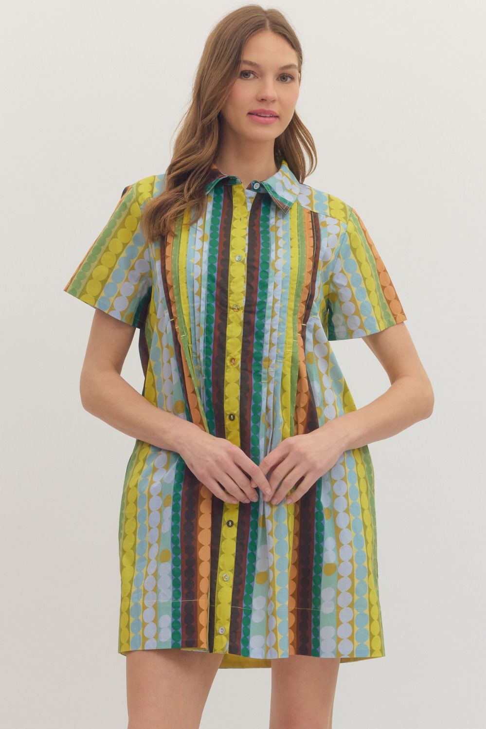 Entro Mod Dots Dress featuring a stylish dotted pattern, sleeveless design, and a flattering fit for casual or dressy occasions.