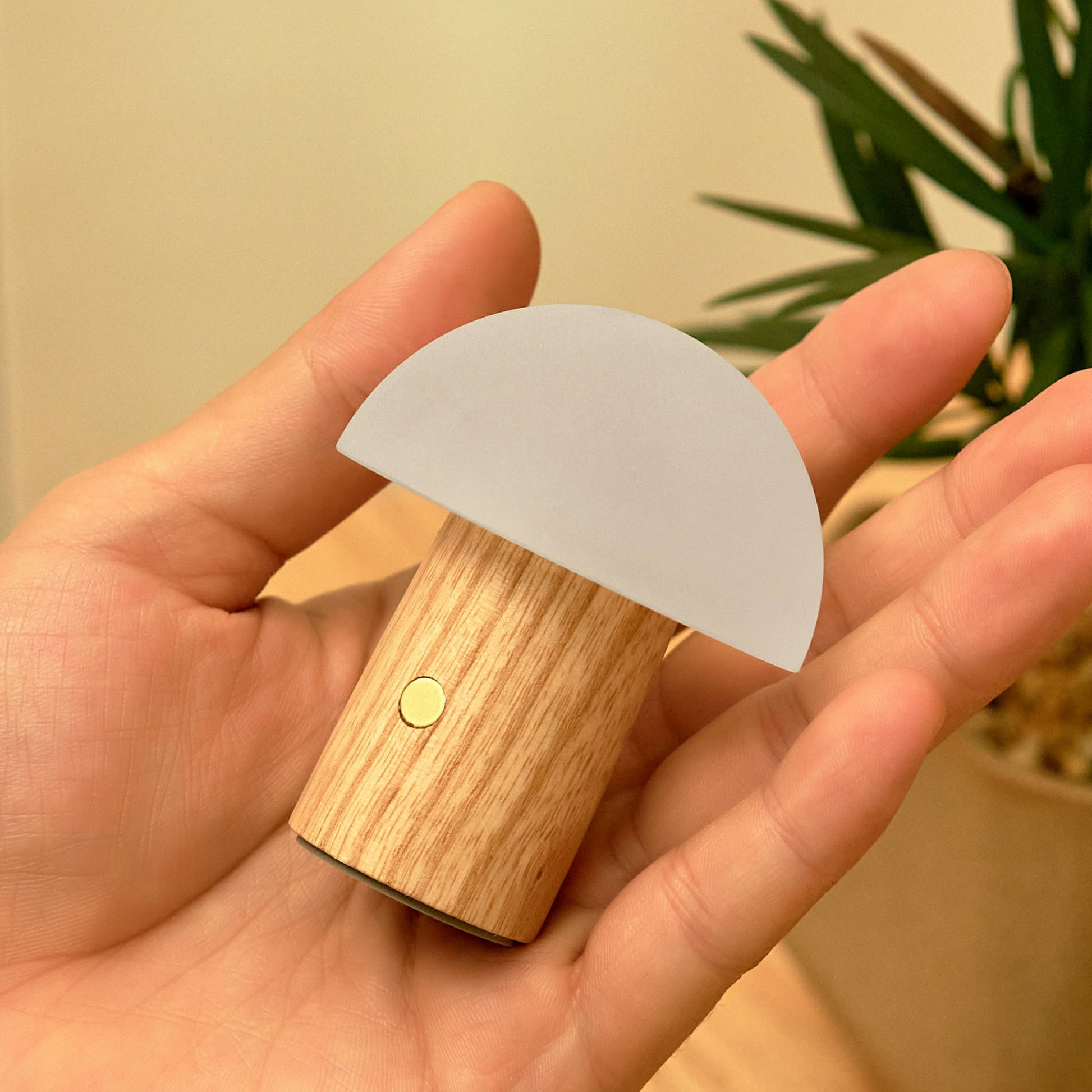 Gingko Design Alice Mushroom Lamp, super mini size, displayed on a wooden surface with warm ambient lighting.