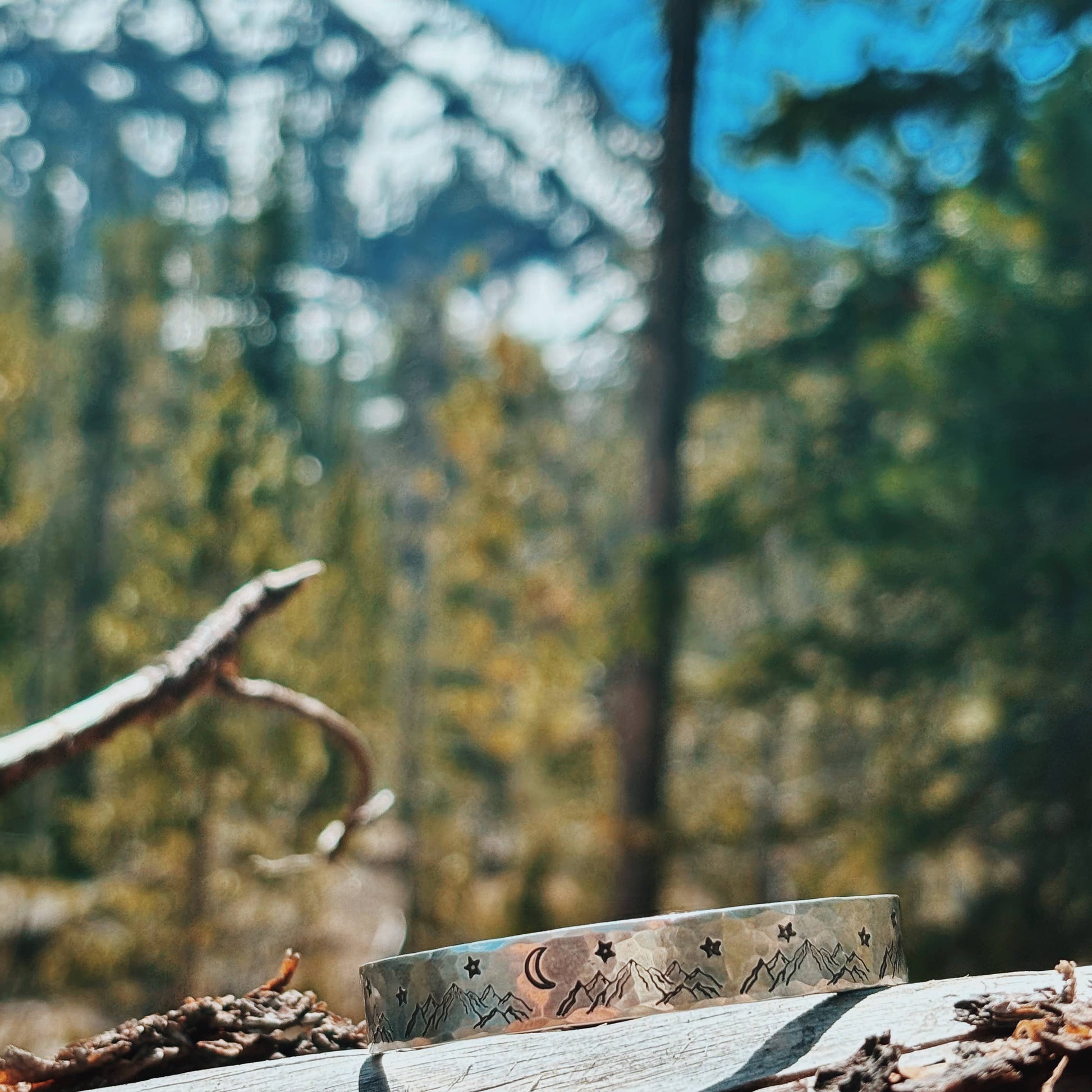 Handmade Mountain High cuff bracelet by Fluff Hardware featuring textured metal design and adjustable fit.