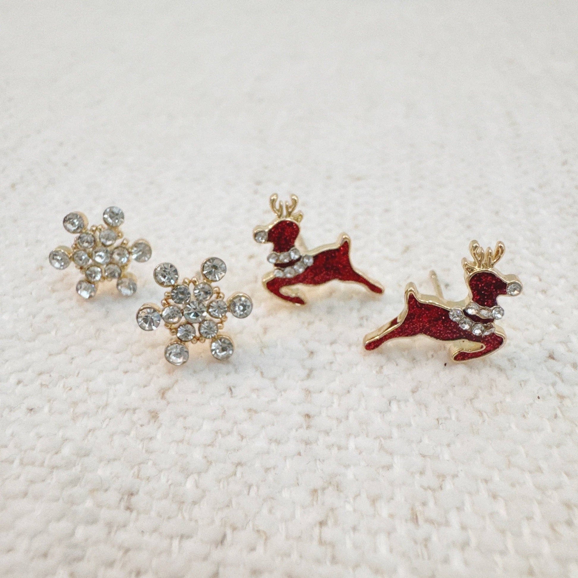 Ellison+Young snowflake stud earring with intricate snowflake design, silver-tone jewelry for elegant winter style.