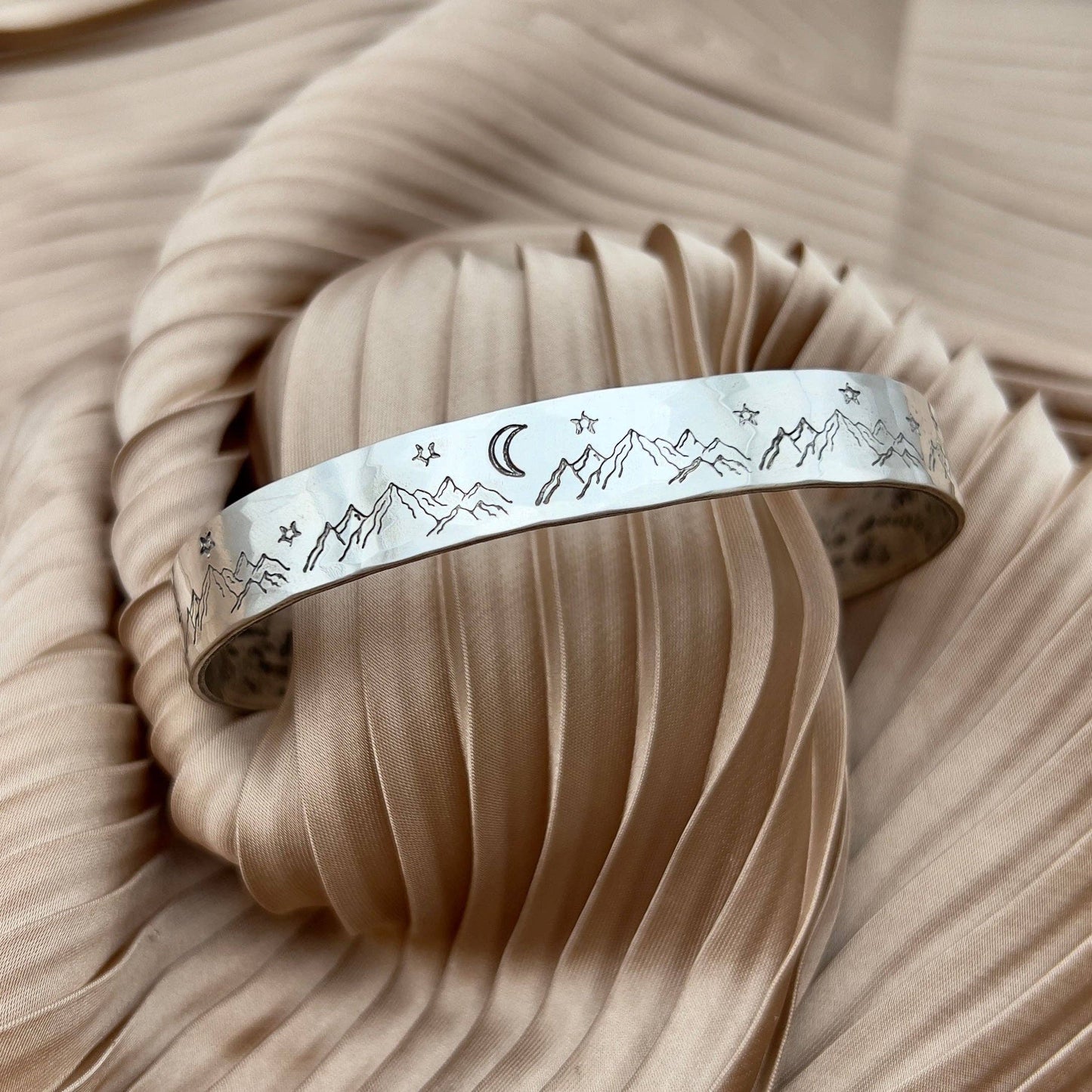 Handmade Mountain High cuff bracelet by Fluff Hardware featuring rugged mountain-inspired design in metal.