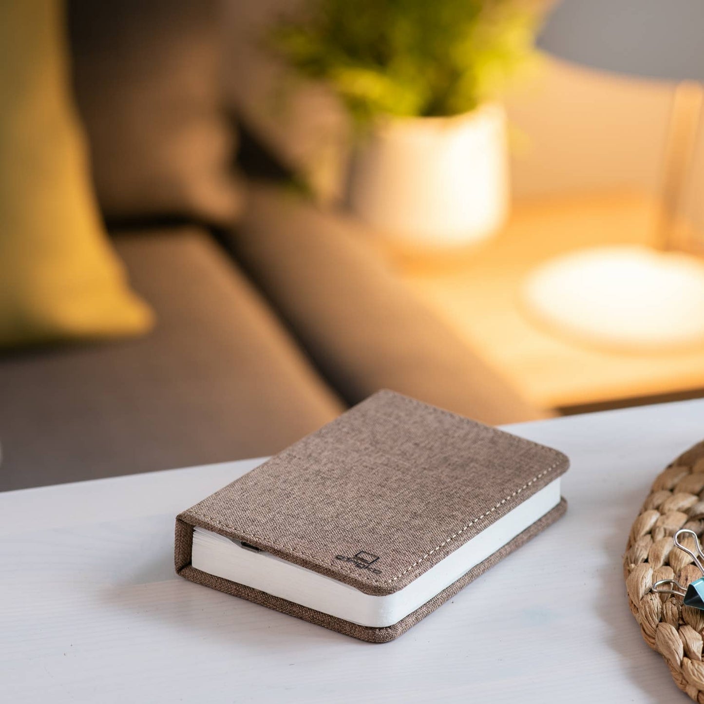 Gingko Design linen fabric smart book light lamp with soft illumination, ideal for reading and relaxing in a cozy space.