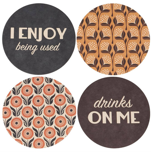 Questionables Drinks On Me coaster set with four stylish barware coasters featuring playful drink-related designs.