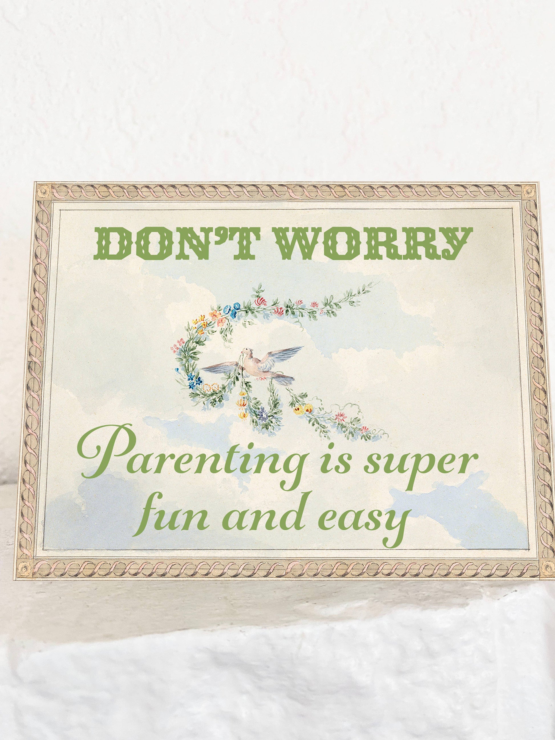 Set of "Parenting is Easy and Fun" cards by The Coin Laundry, featuring colorful illustrations and parenting tips.