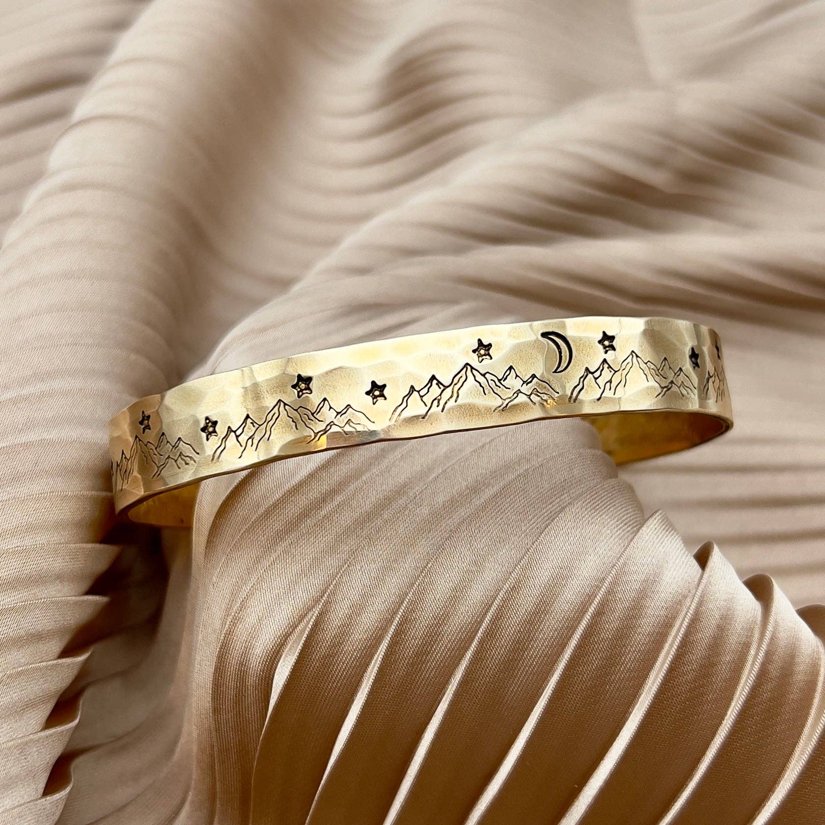 Handmade Mountain High cuff bracelet by Fluff Hardware featuring rugged metal design and mountain-inspired accents.