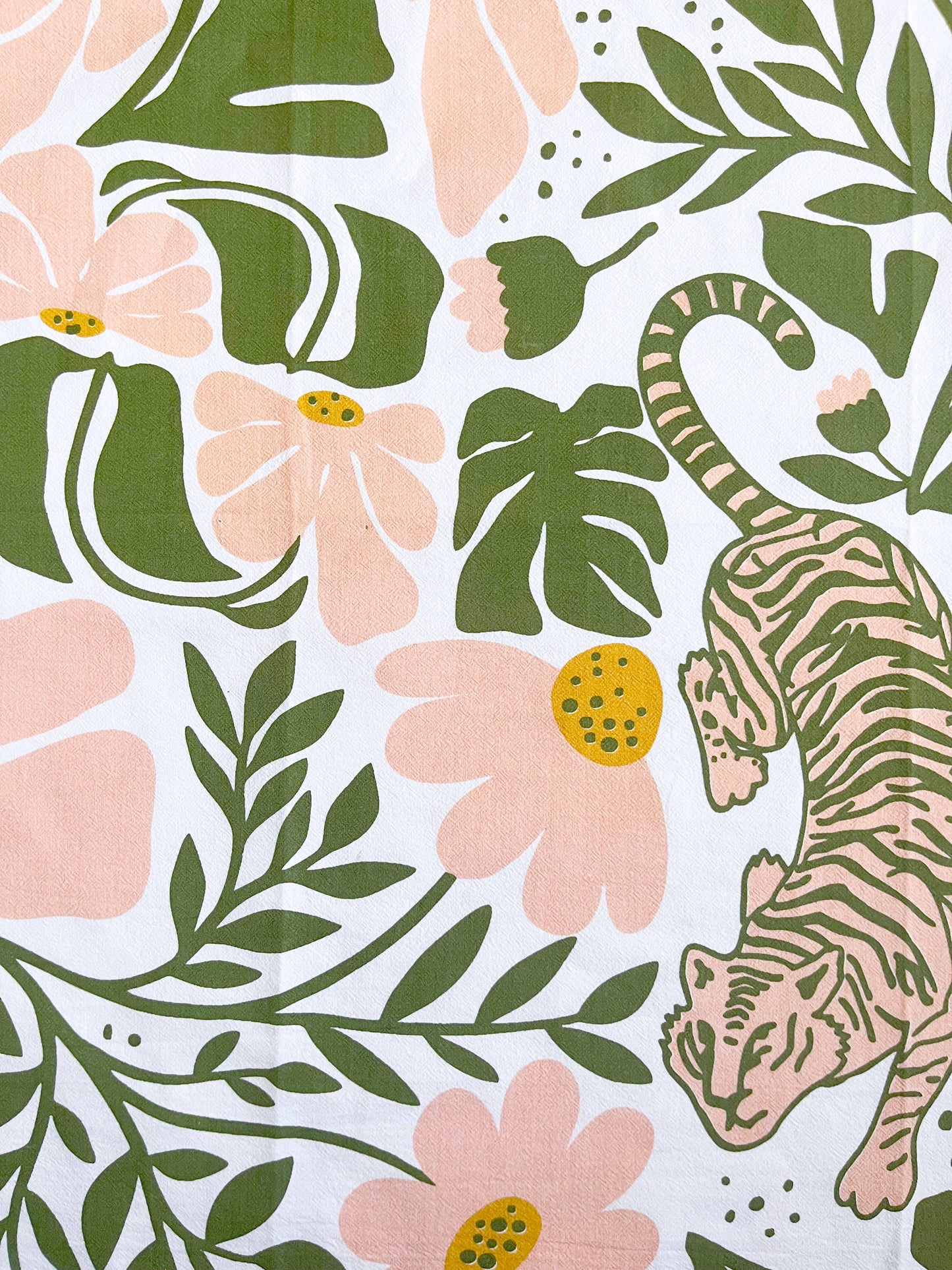 Pink and green floral tea towel featuring tiger and modern boho design, ideal for kitchen decor and hand drying.
