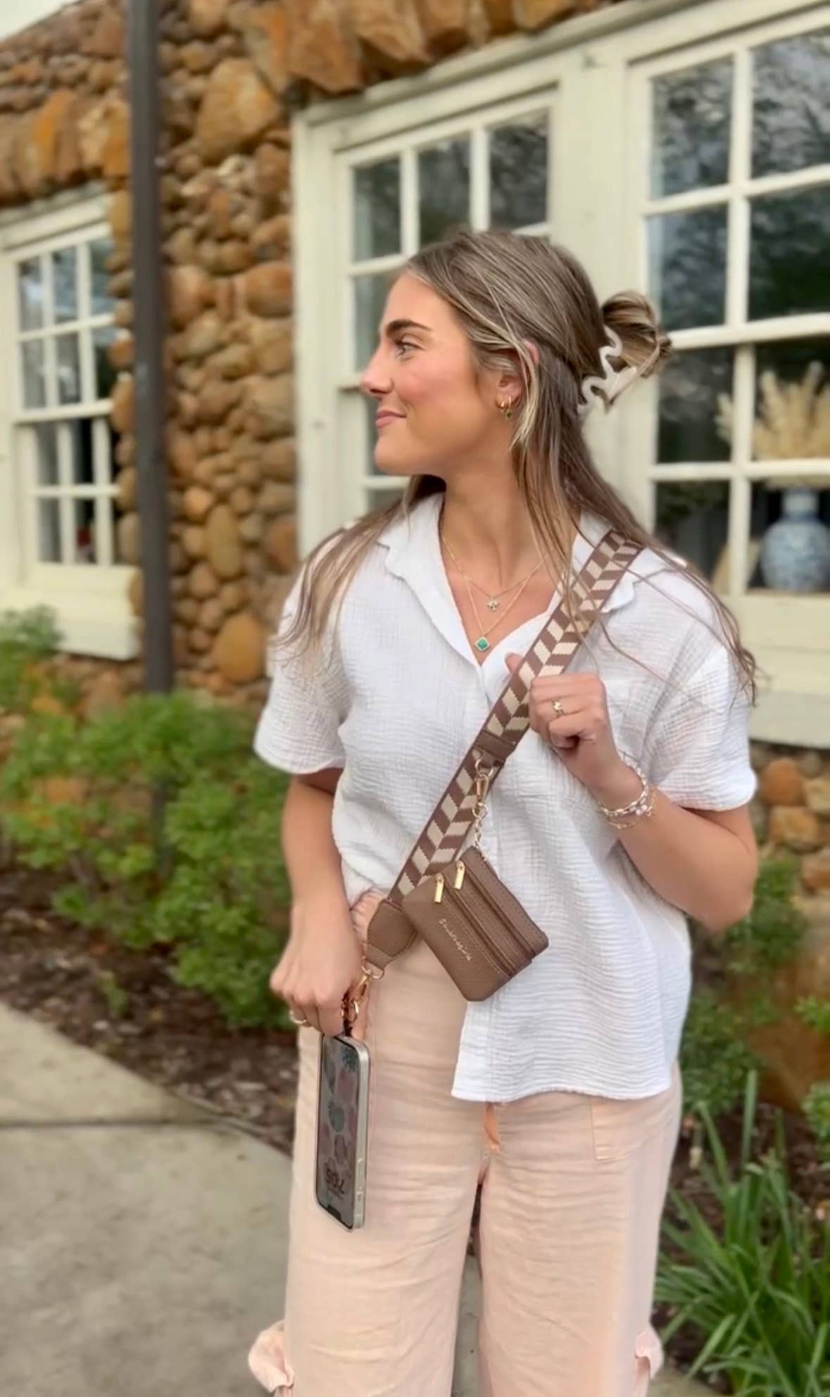 Save The Girls Clip & Go Crossbody Strap with zippered pouch, adjustable phone chain and strap for secure carrying and style.