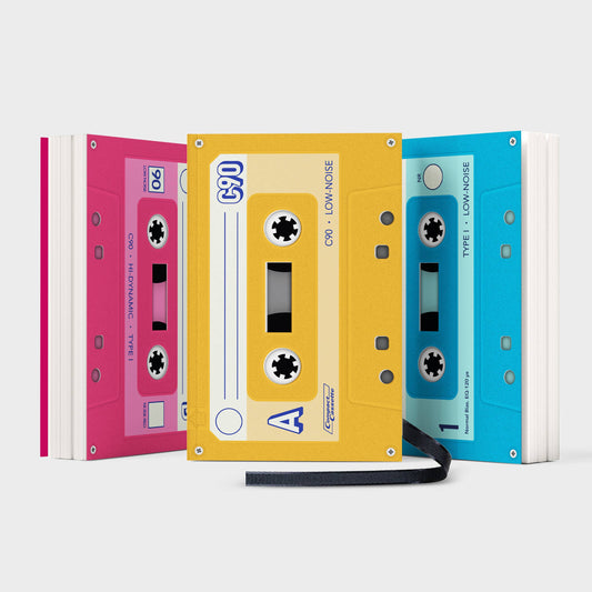 Colorful Mixtape Notebook by SUCK UK Ltd - USA, featuring a vibrant cover design with a spiral binding for note-taking and creativity.