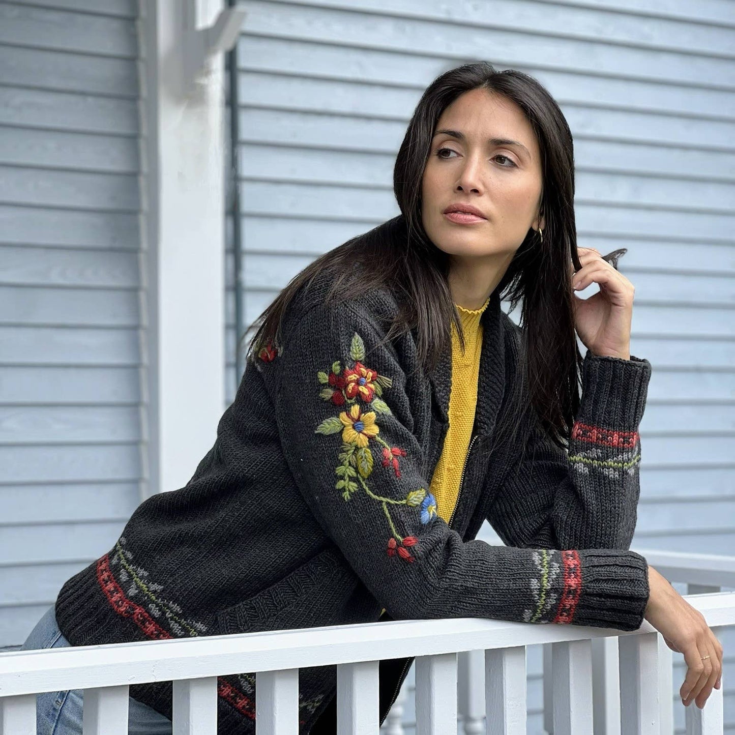 Lost Horizons Knitwear Hartley Floral Antler Sweater featuring a cozy knit design with floral and antler patterns.