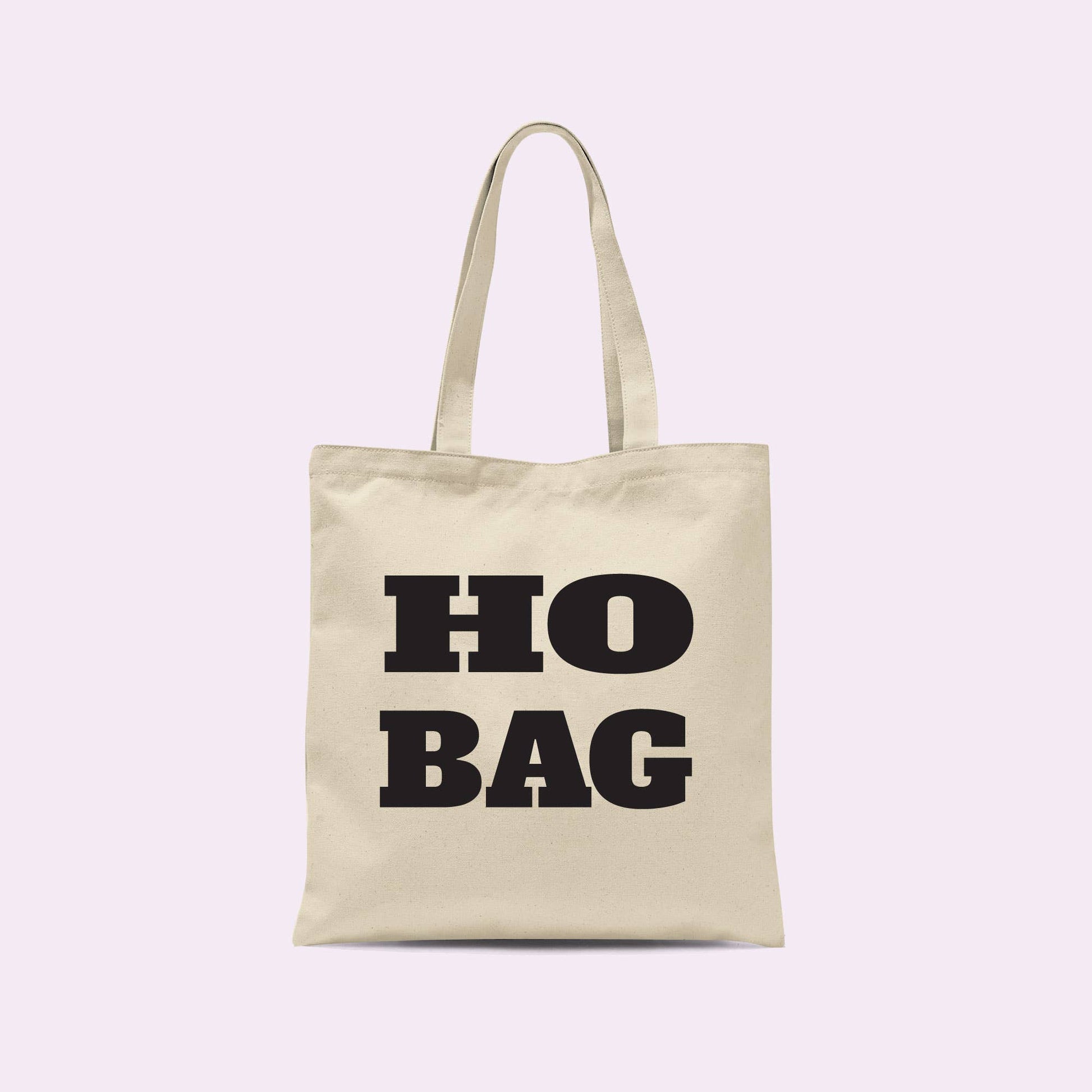 Crimson and Clover Studio Ho Bag Funny Tote Bag with card design, featuring vibrant colors and playful graphics.