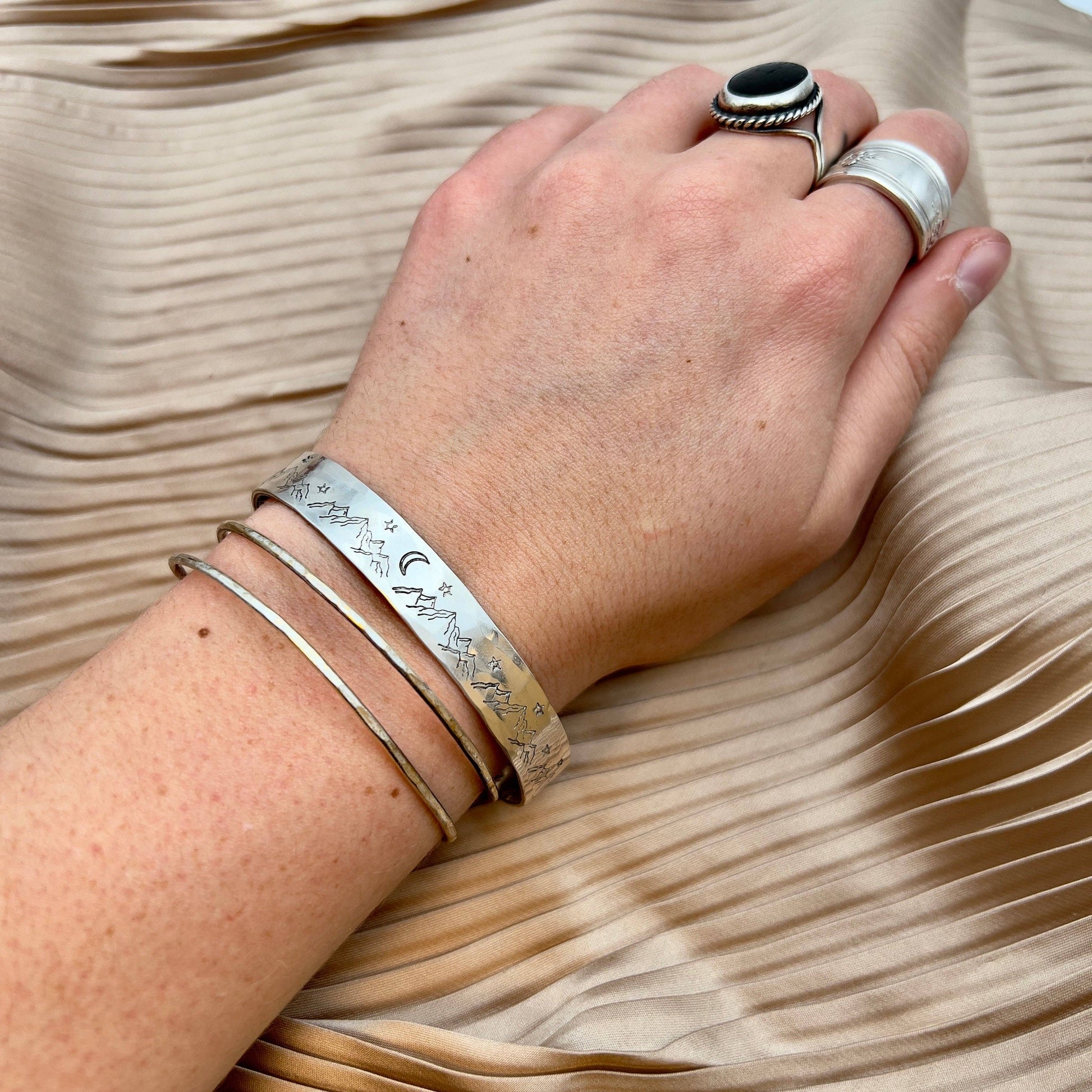 Handmade Mountain High cuff bracelet by Fluff Hardware featuring rugged mountain-inspired design in metal.