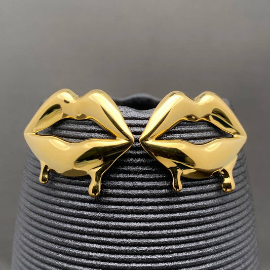 Glossy Lips earrings by Mio Queena featuring bright, glossy lip-shaped earrings with a playful, stylish design.