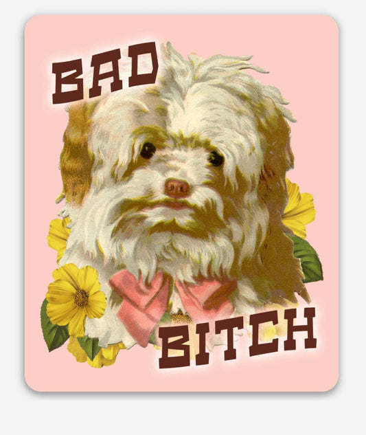 Pink puppy dog sticker with flowers, featuring the humorous "Bad Bitch" phrase, by The Coin Laundry, for decorating laptops or notebooks.