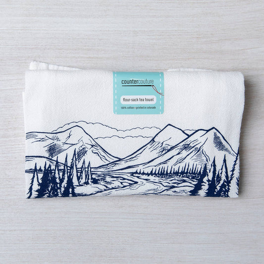 Screen printed mountain tea towel by Counter Couture, made in USA, featuring a detailed mountain landscape design for kitchen decor.