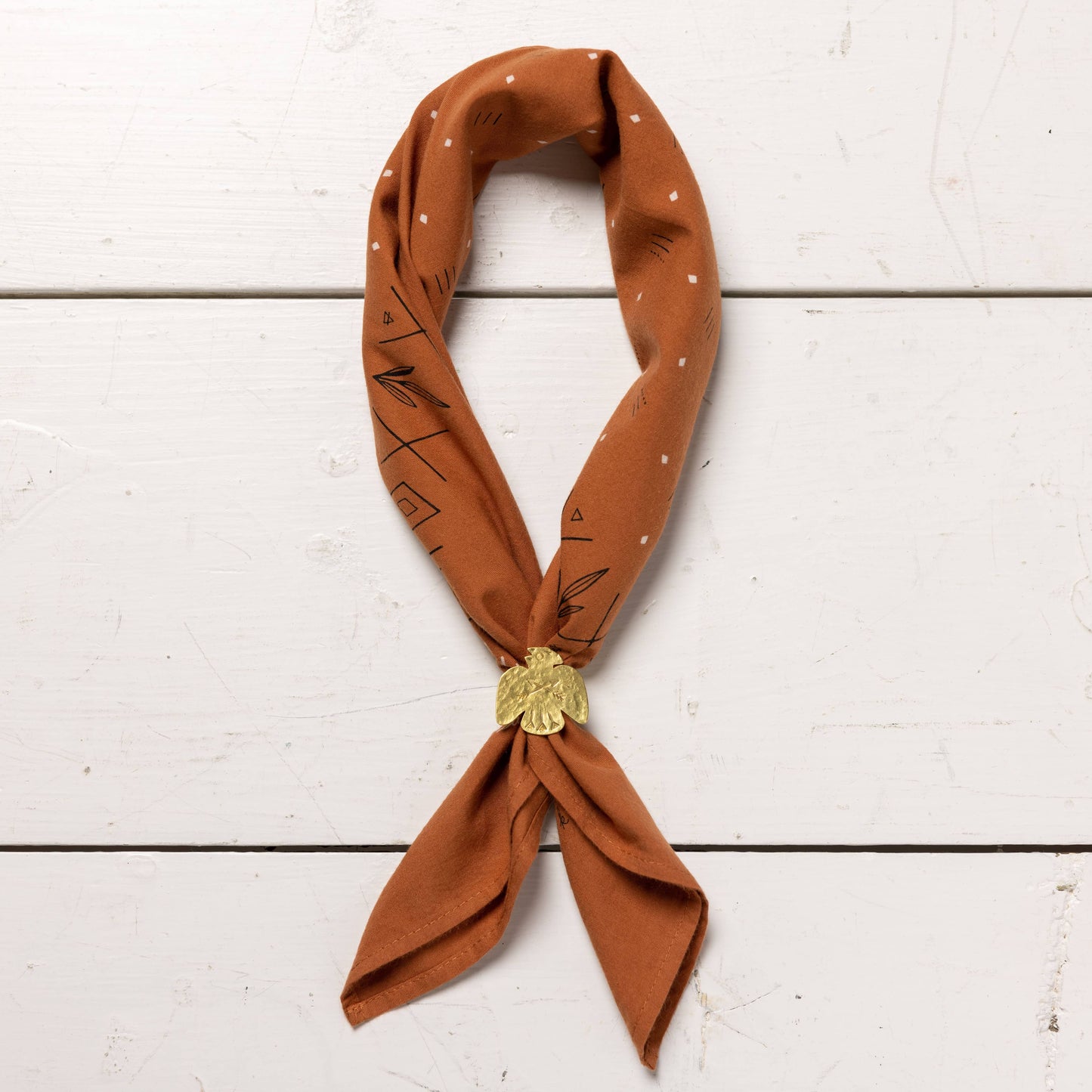 Small brass thunderbird bandana slide