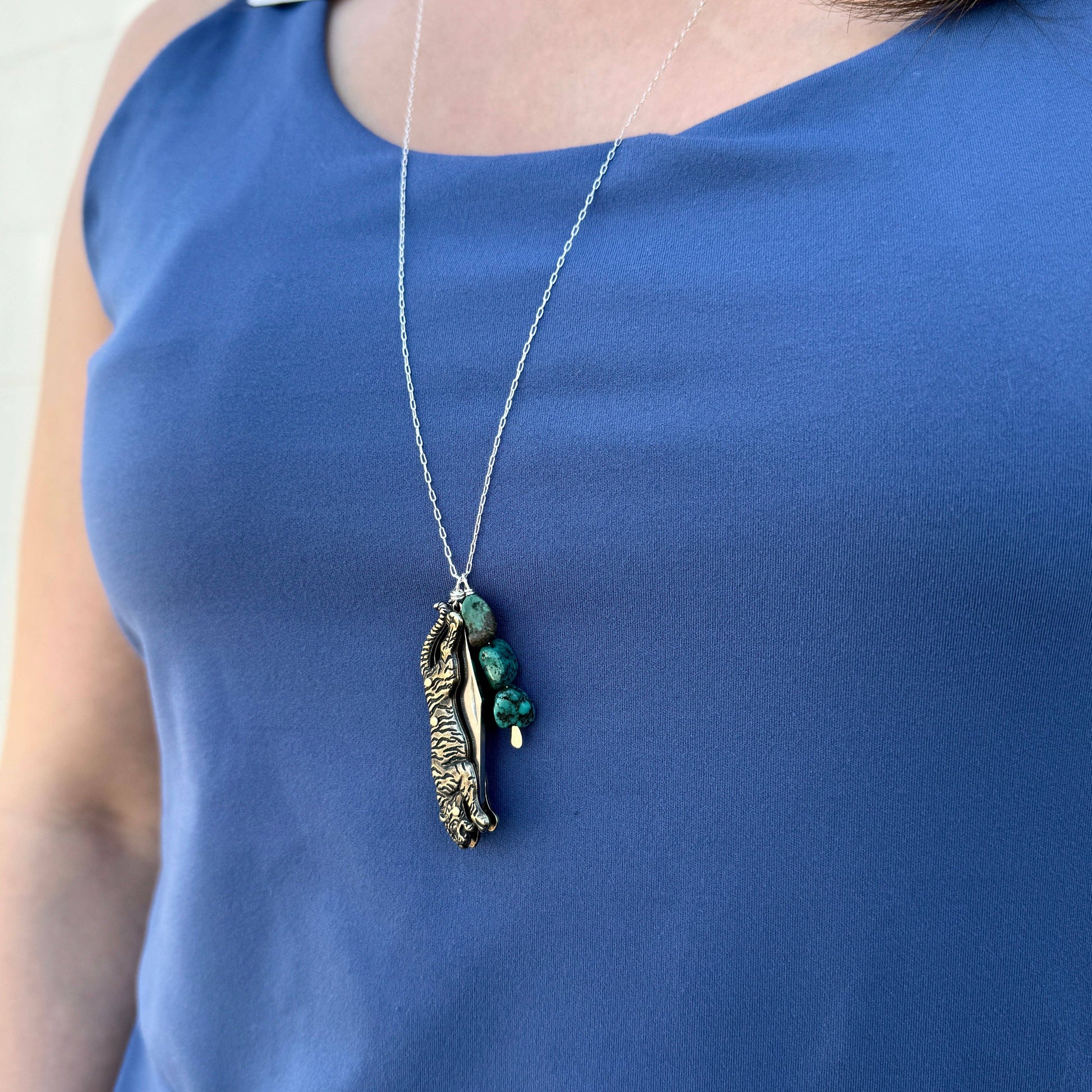 Untamed Necklace by Fluff Hardware featuring a unique, intricate pendant on a sleek chain, displayed against a neutral background.