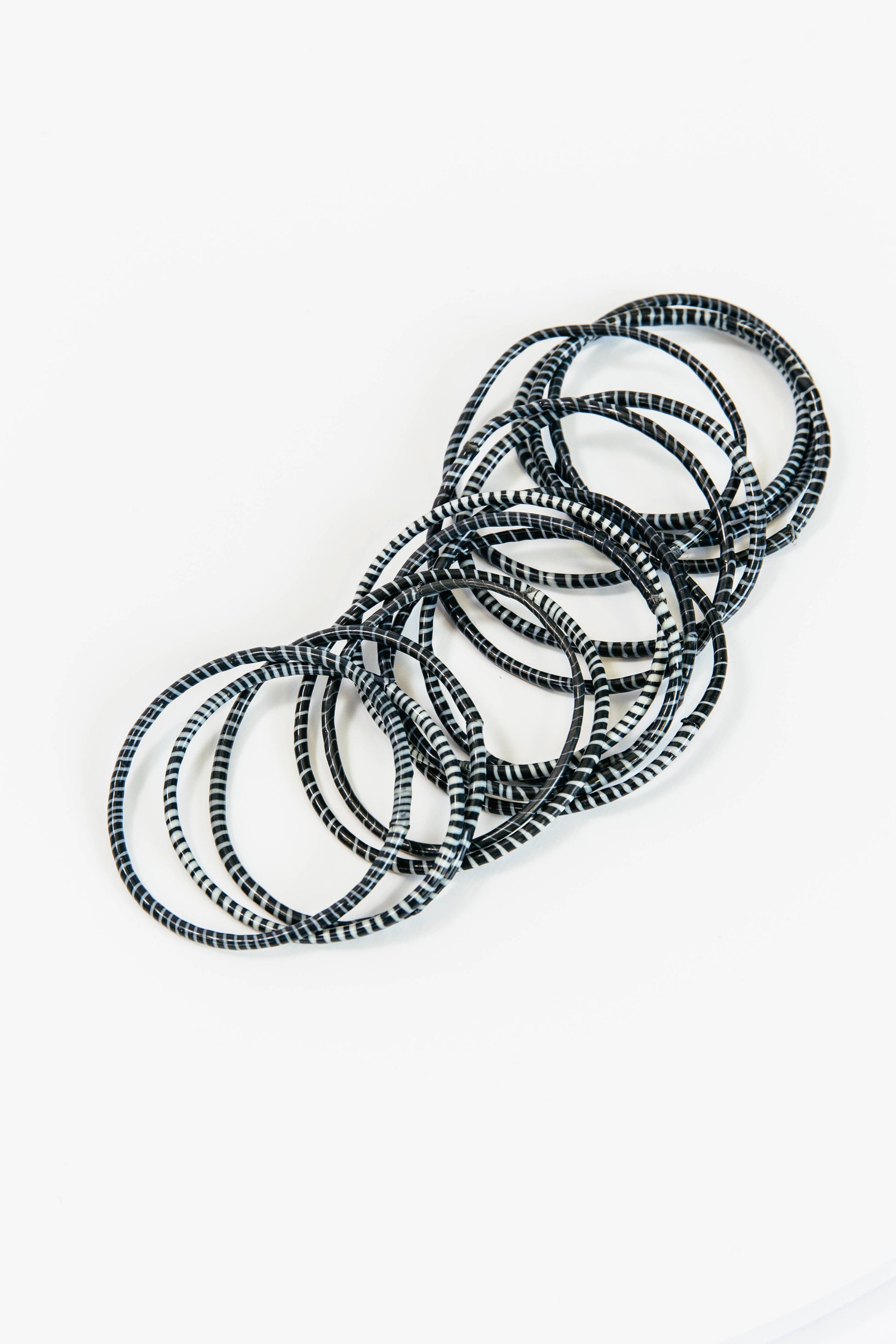 Black Beach Bangles bracelet by BECASA featuring multiple layered bangles with a stylish beach-inspired design.