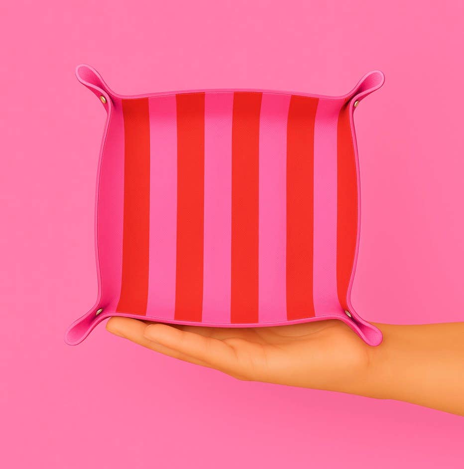 Pink and red striped Aspen Lane trinket tray with a rectangular shape, perfect for organizing jewelry and small accessories.