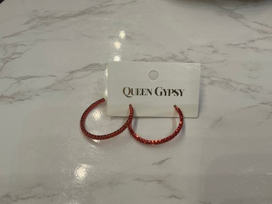 Red crystal hoop earrings from Queen Gypsy featuring vibrant red crystals and a stylish hoop design.