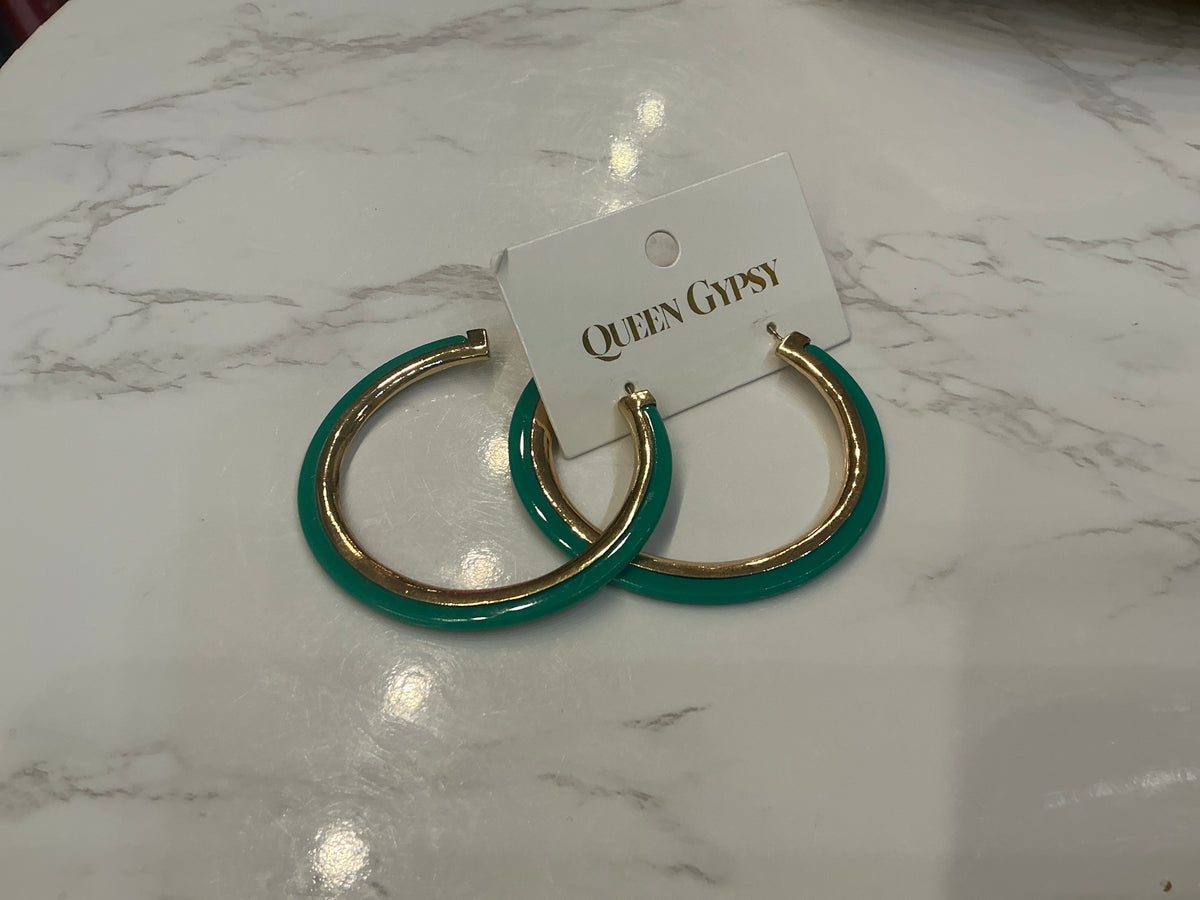 Gold inlay hoop earrings from Queen Gypsy featuring sleek circular design and shiny gold finish.