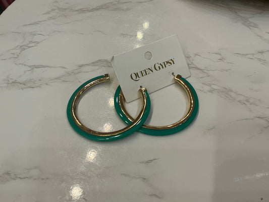 Gold inlay hoop earrings from Queen Gypsy featuring sleek circular design and shiny gold finish.