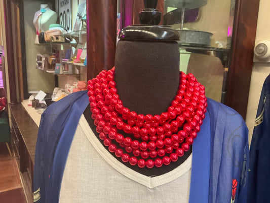 Queen Gypsy beaded collar necklace featuring colorful beads and intricate design on a neutral background.