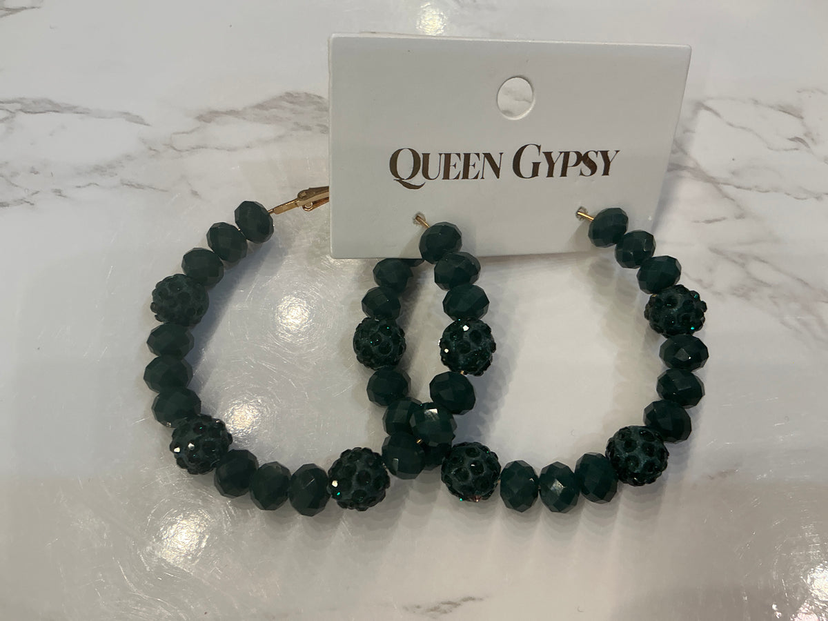 Queen Gypsy Pave Beaded Hoop Earrings featuring intricate beadwork and a stylish hoop design.