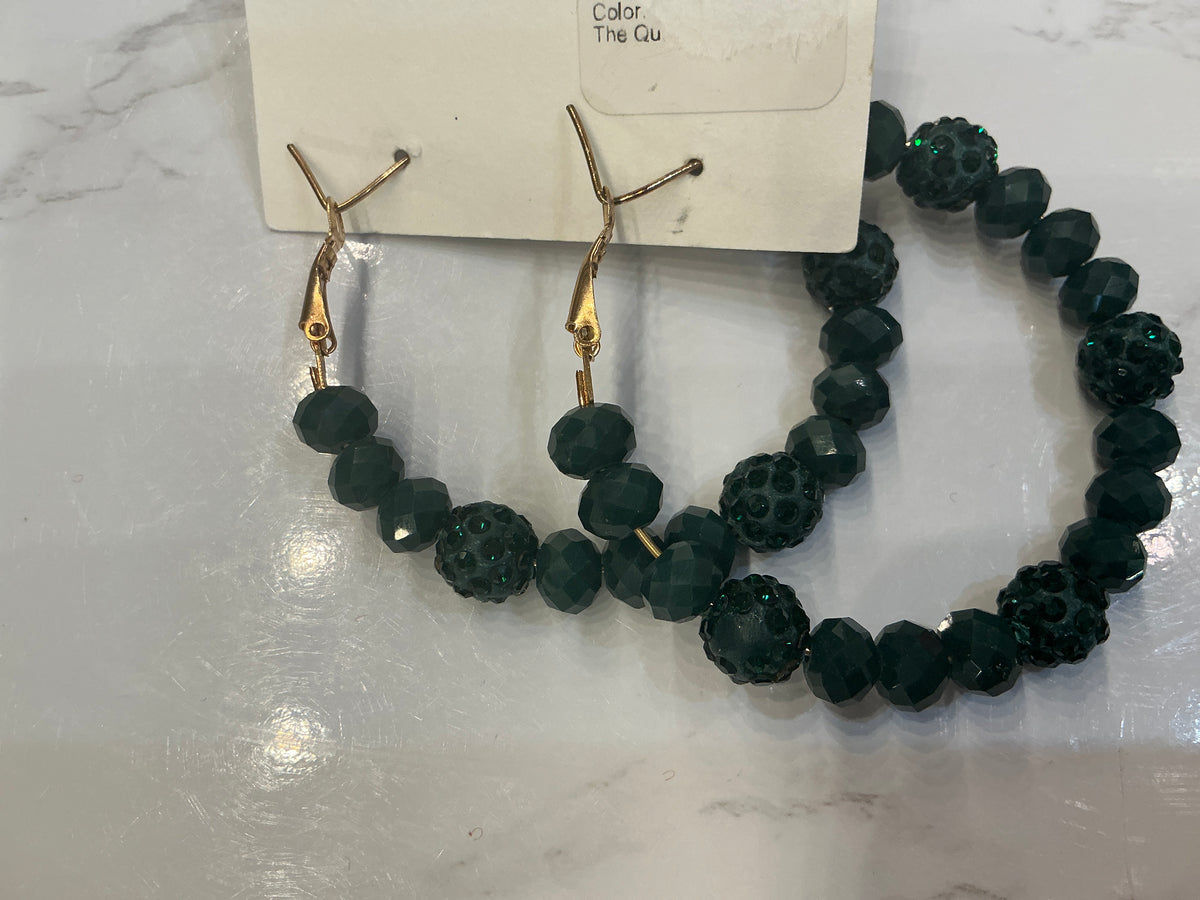 Queen Gypsy Pave Beaded Hoop Earrings with intricate beaded details and metal hoops, stylish accessory for any occasion.