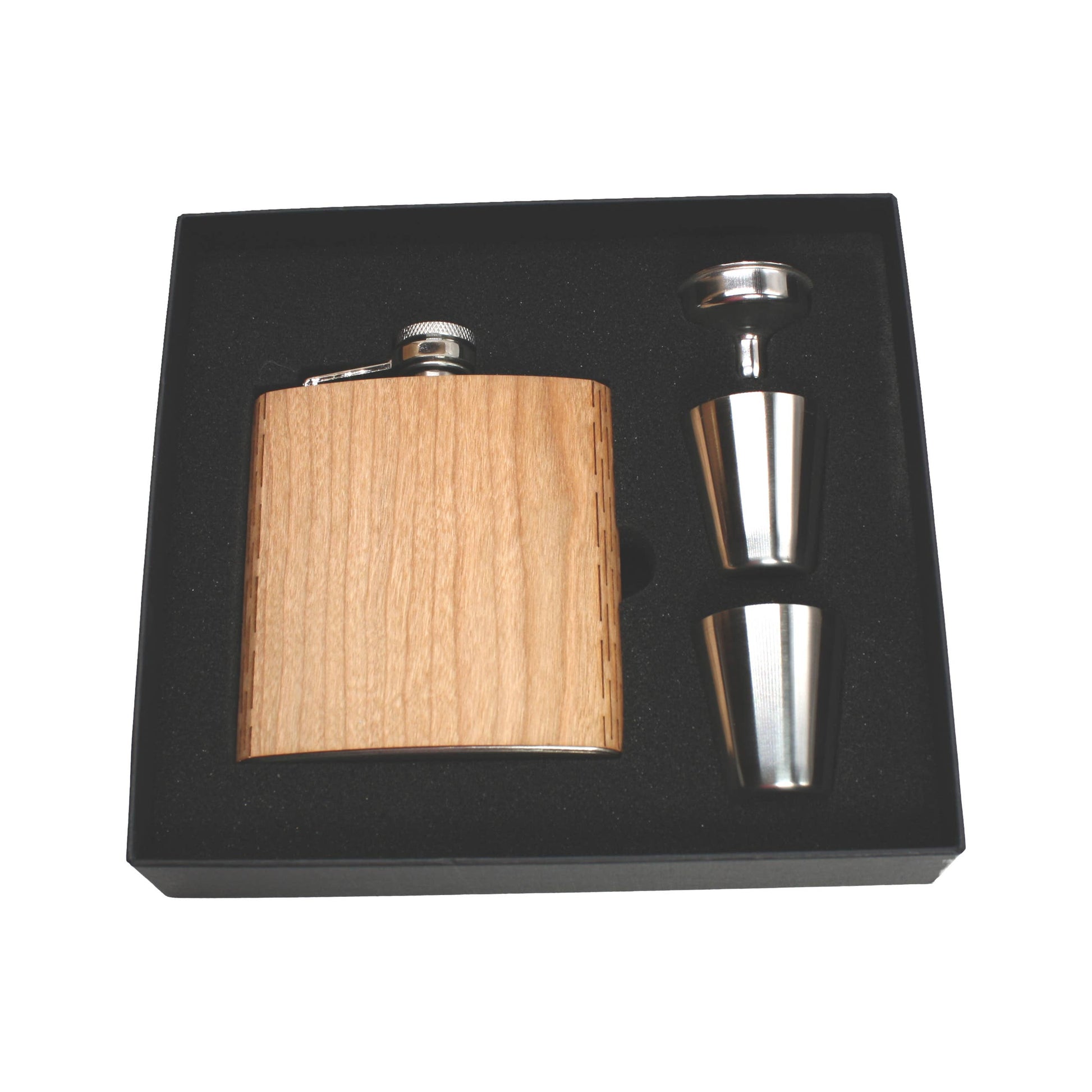 WUDN Handcrafted 6 oz. wooden hip flask with aromatic cedar finish, gift box, shot glasses, and funnel, displayed with accessories.
