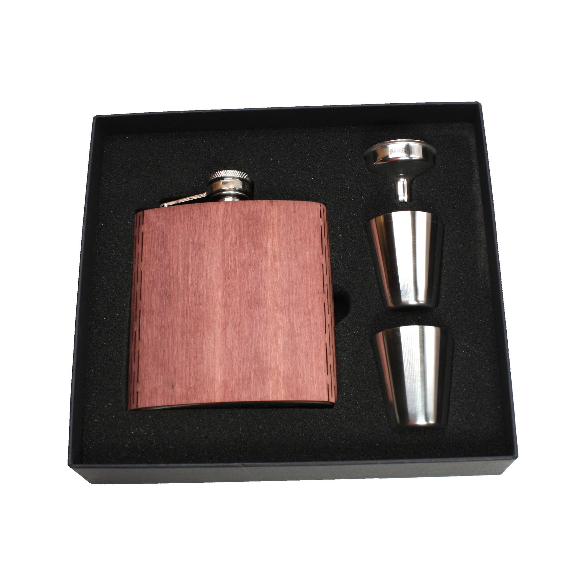 WUDN Handcrafted 6 oz. wooden hip flask with aromatic cedar finish, gift box, shot glasses, and funnel displayed on a wooden surface.