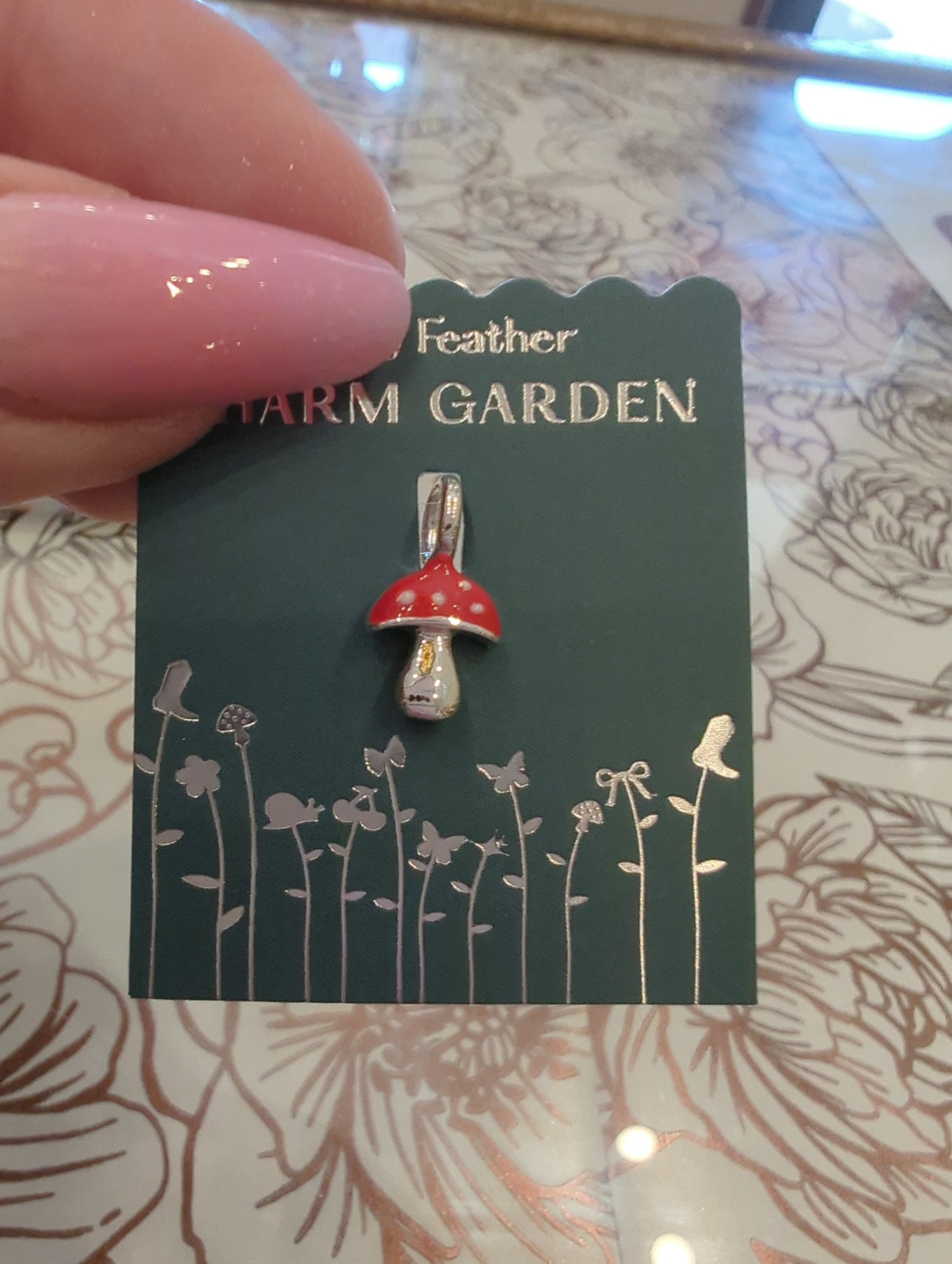 Lucky Feather Charm Garden mushroom silver charm featuring a detailed mushroom design, perfect for jewelry or charm bracelets.