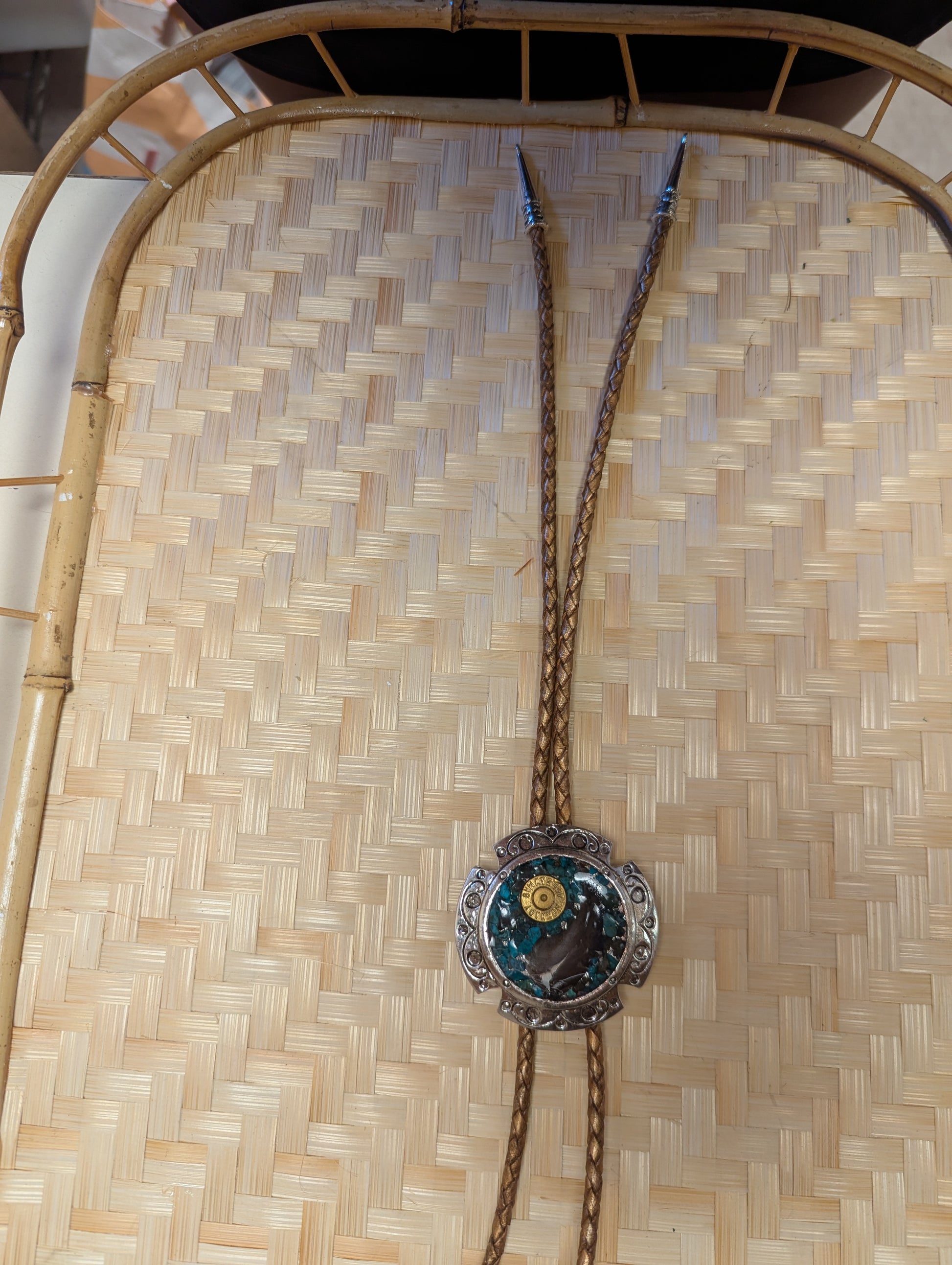 Badass Bolo Tie by BadAssBabe featuring a silver-tone slide and cord, stylish western accessory for men and women.